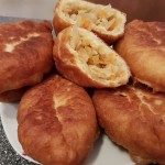 Pirozhki fry stuffed with sour cabbage