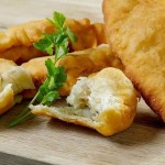 Pirozhki fry stuffed with potatoes