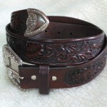 Belt with buckle and tip