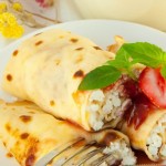 Pancakes stuffed with sweet cottage cheese 
